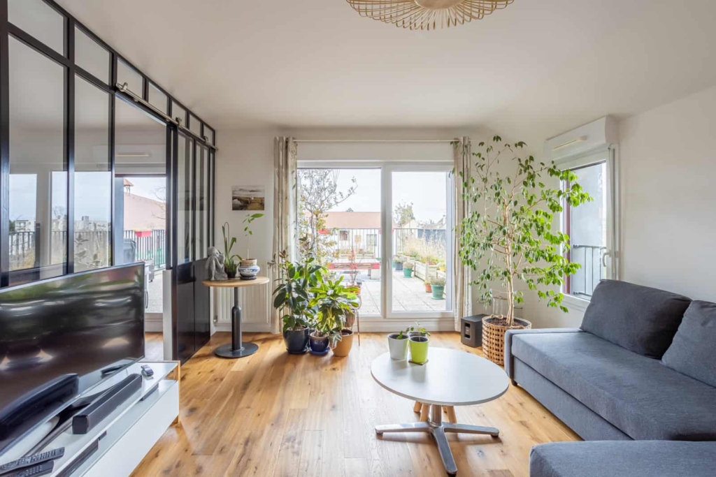 Salon et séjour d'un appartement F4 - photo immobilière Calvados