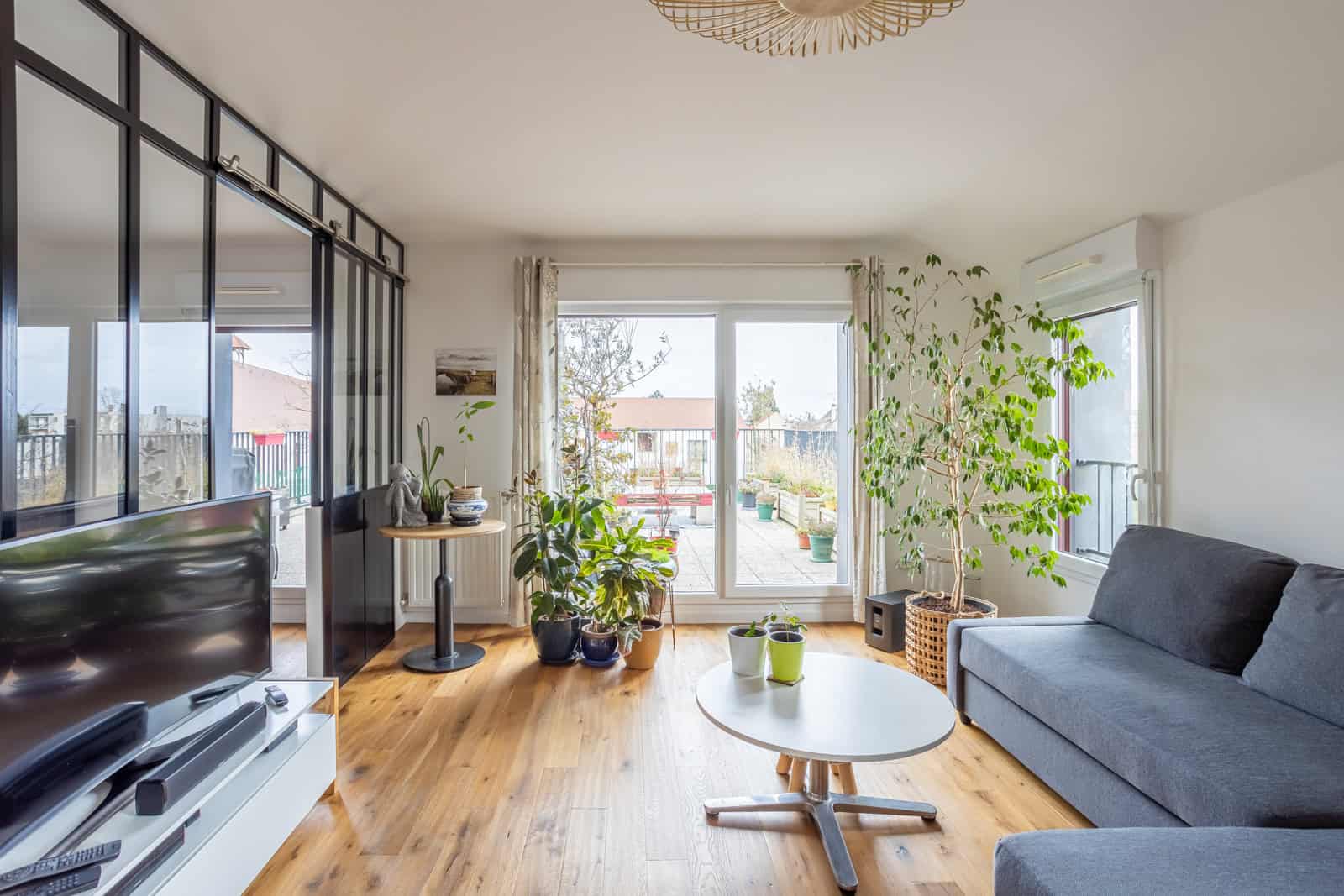 Salon et séjour d'un appartement F4 - photo immobilière Calvados